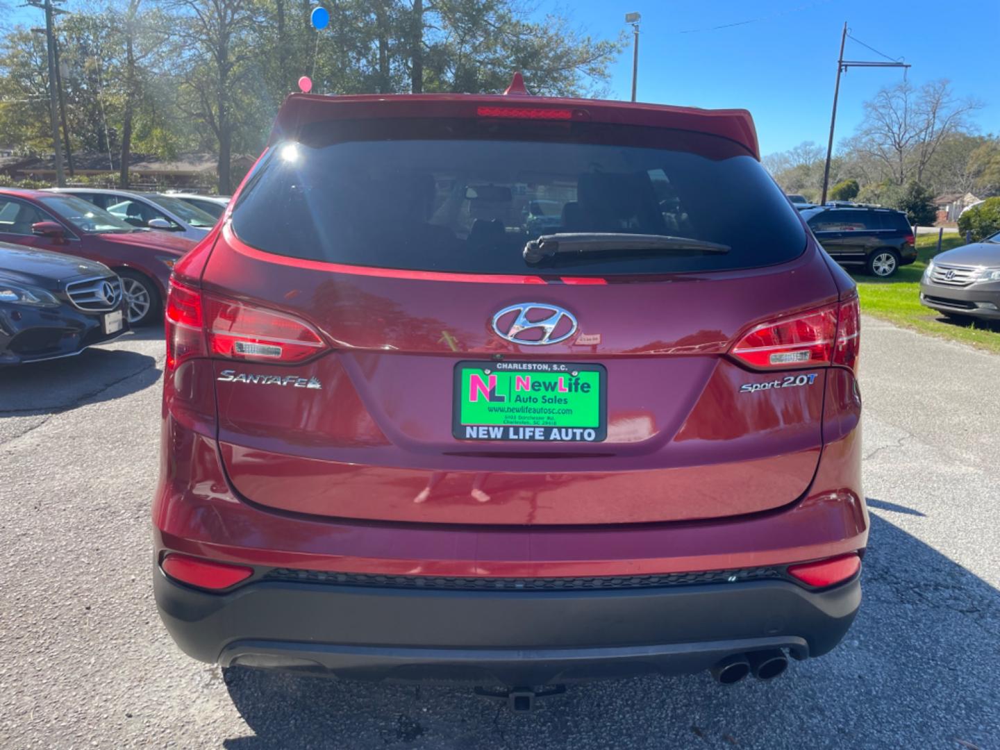 2013 RED HYUNDAI SANTA FE SPORT 2.0T (5XYZU3LA3DG) with an 2.0L engine, Automatic transmission, located at 5103 Dorchester Rd., Charleston, SC, 29418-5607, (843) 767-1122, 36.245171, -115.228050 - Leather, CD/AUX/Sat/Bluetooth, Dual Climate, Power Everything (windows, locks, seats, mirrors), Heated Seats, Rear Heated Seats, Push Button Start, Keyless Entry, Alloy Wheels. Local Trade-in!! Located at New Life Auto Sales! 2023 WINNER for Post & Courier's Charleston's Choice Pre-owned Car Dealer - Photo#5